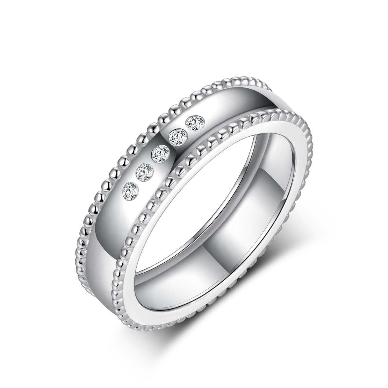 Wide sterling silver men's wedding band with beaded edges and five sparkling moissanite stones.