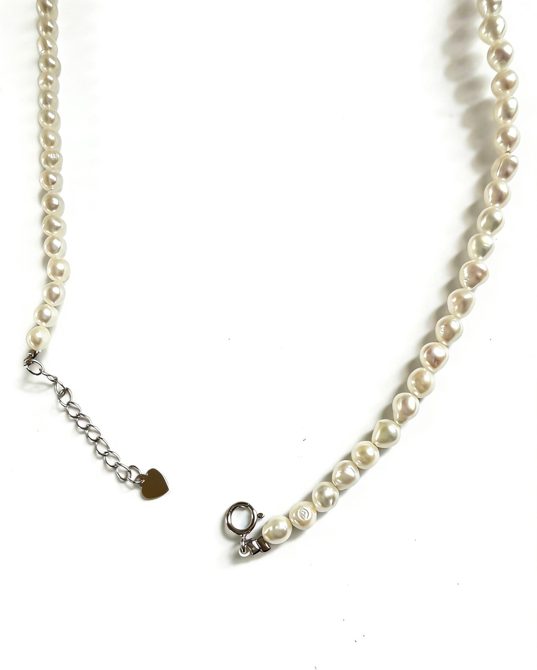 Minimalist 3–4mm white baroque freshwater pearl choker necklace with 925 sterling silver clasp and heart charm.