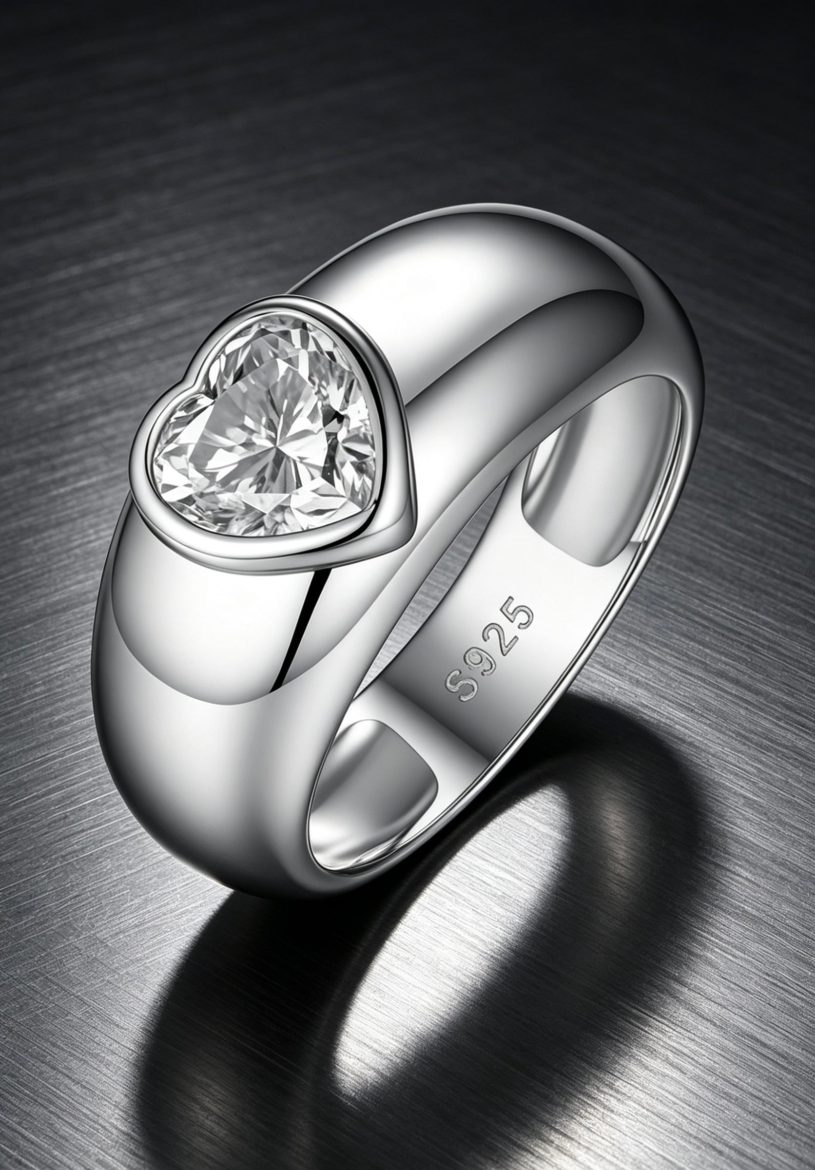 1.2ct heart-cut moissanite ring in a polished S925 silver dome band with a secure bezel setting.
