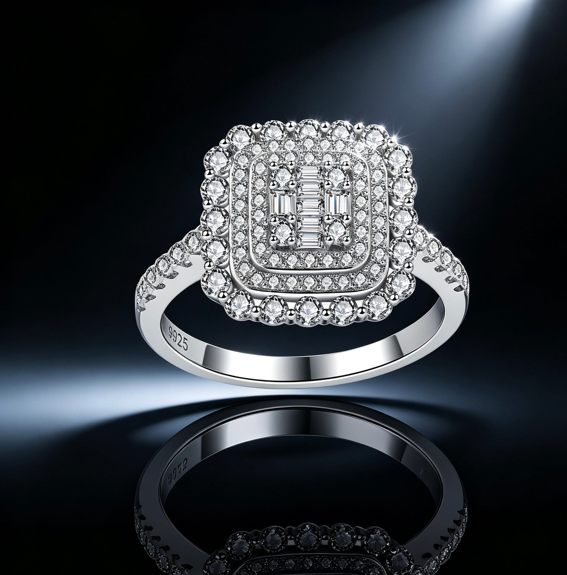 Square double halo moissanite ring in S925 silver with a baguette cluster center and pavé band on a dark reflective surface.