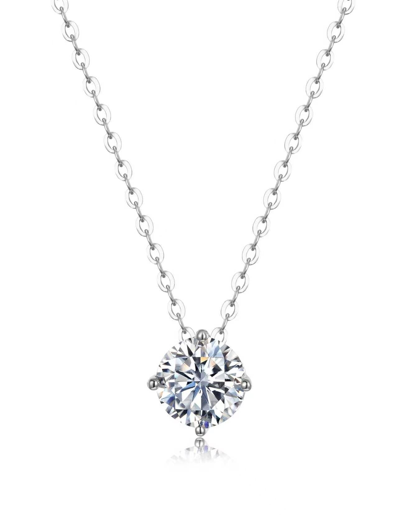D-color VVS1 moissanite solitaire necklace in a four-prong S925 sterling silver crown setting on a delicate chain.