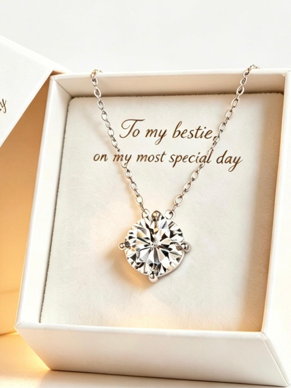 Luvymia Ariel moissanite pendant on a silver chain in a gift box with the inscription To my bestie on my most special day.