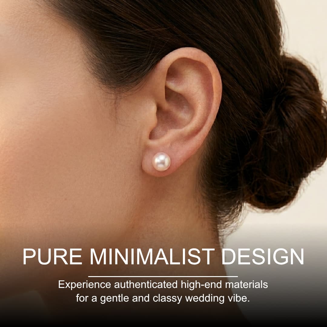 7mm natural saltwater pearl stud earrings with a soft luster worn on an earlobe, featuring a minimalist design.