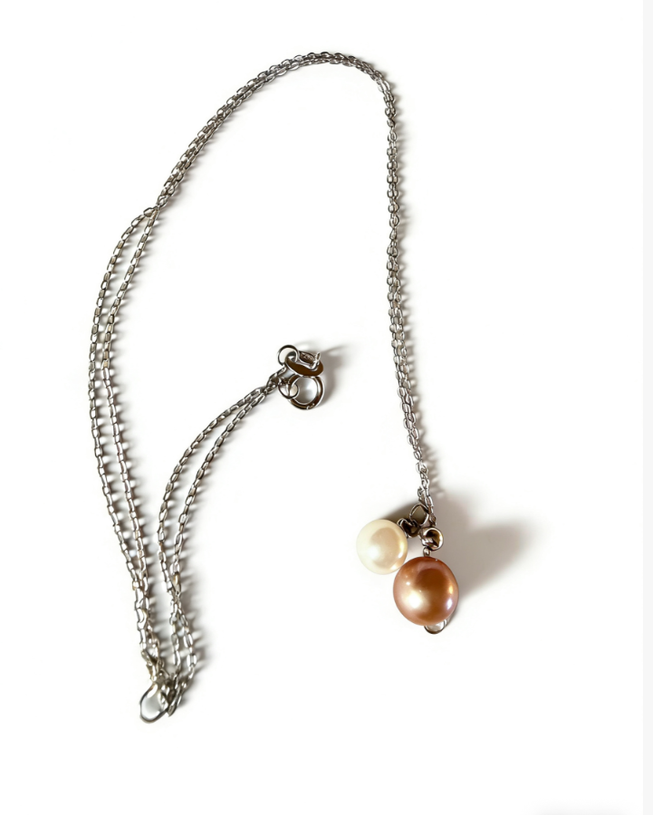Double freshwater pearl pendant necklace with 6-7mm peach pink and 4-5mm white pearls on a 925 sterling silver chain.
