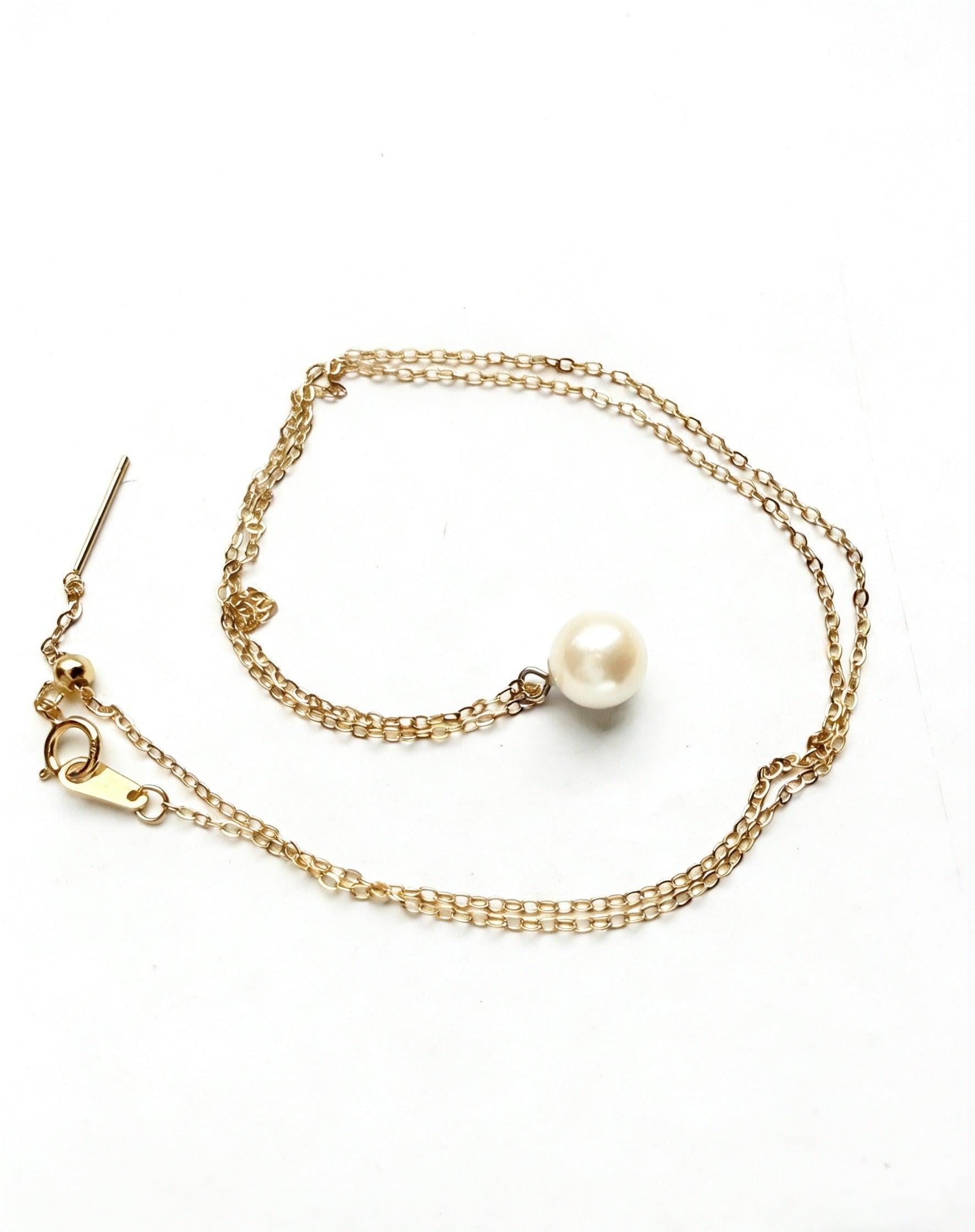 7mm round saltwater Hepu pearl pendant on a delicate gold-plated chain.