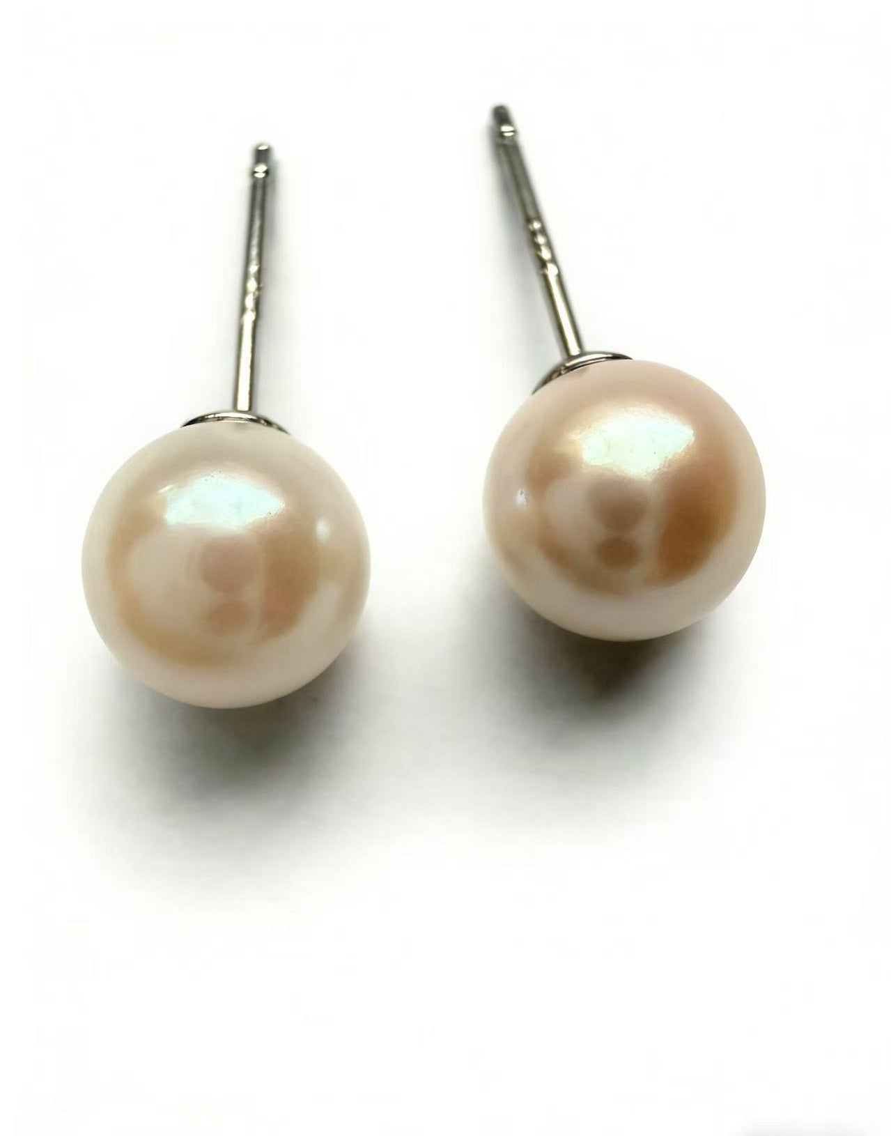 7mm round South Sea saltwater pearl stud earrings with 925 sterling silver posts on a white background.