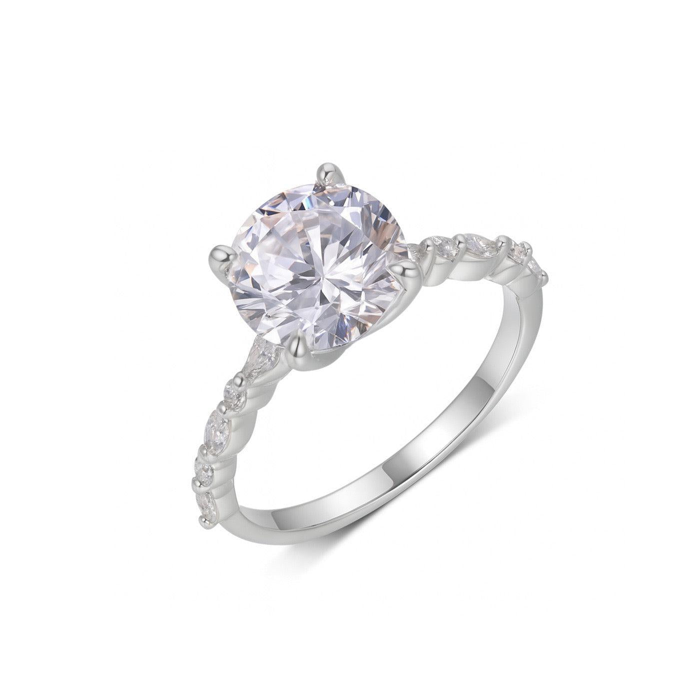 9mm round moissanite ring in S925 silver with marquise-cut accent stones along the band.