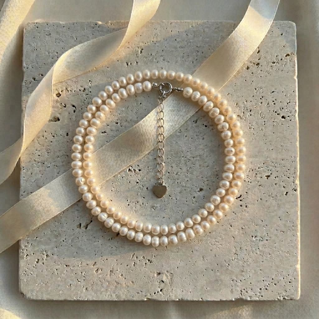 Minimalist Luvymia 3-4mm near-round freshwater pearl necklace with 925 sterling silver clasp and heart charm.
