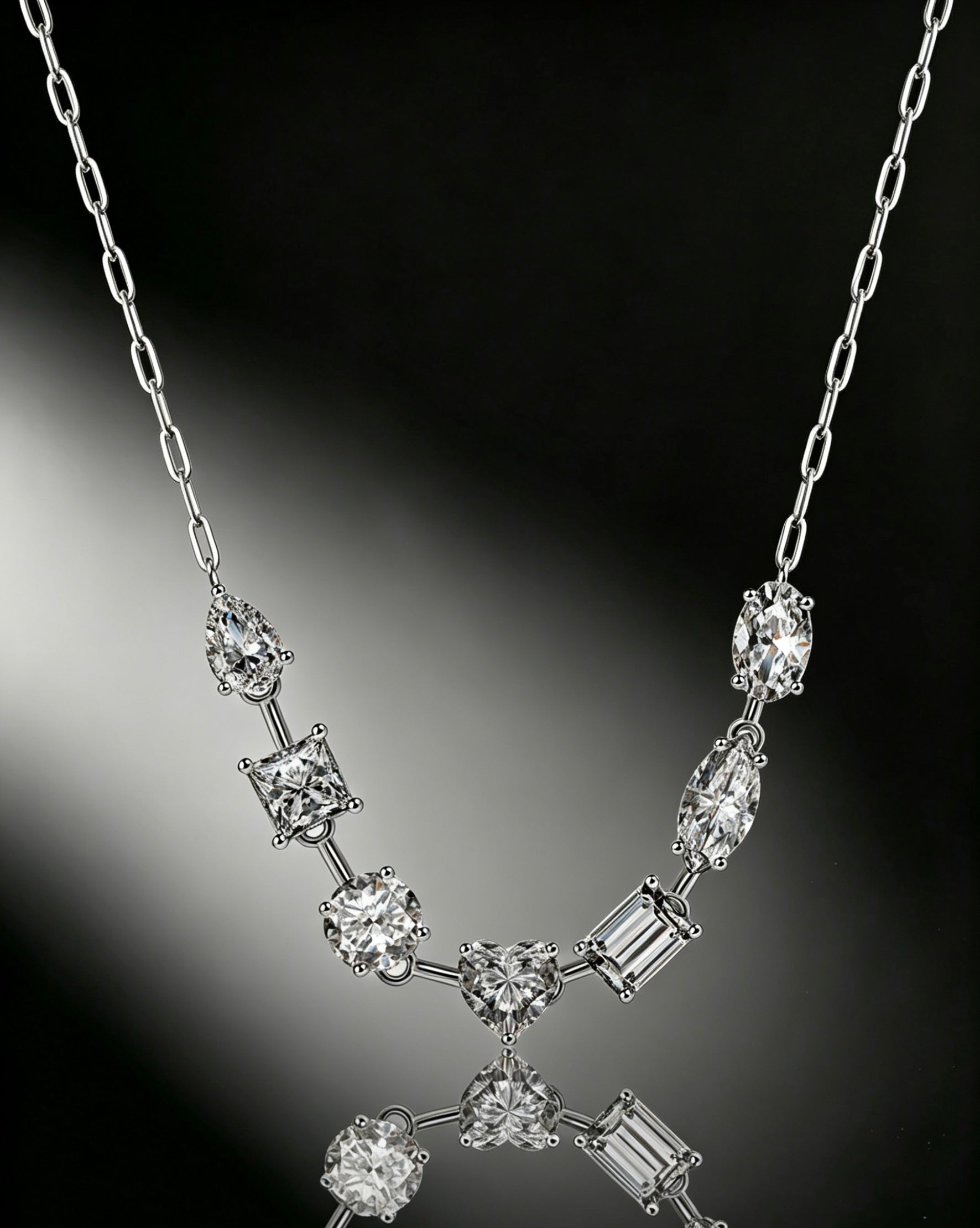 Luvymia sterling silver necklace featuring multi-shape D-color moissanite stones in a delicate chain design.